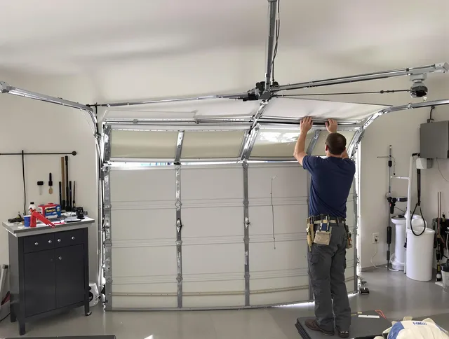 Pooler Garage Door Repair specialist performing precise section replacement on Pooler garage door