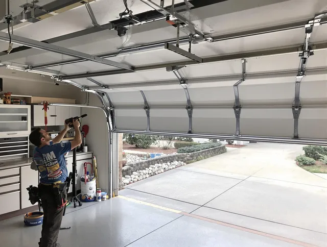 Garage door track repair service by Pooler Garage Door Repair in Pooler